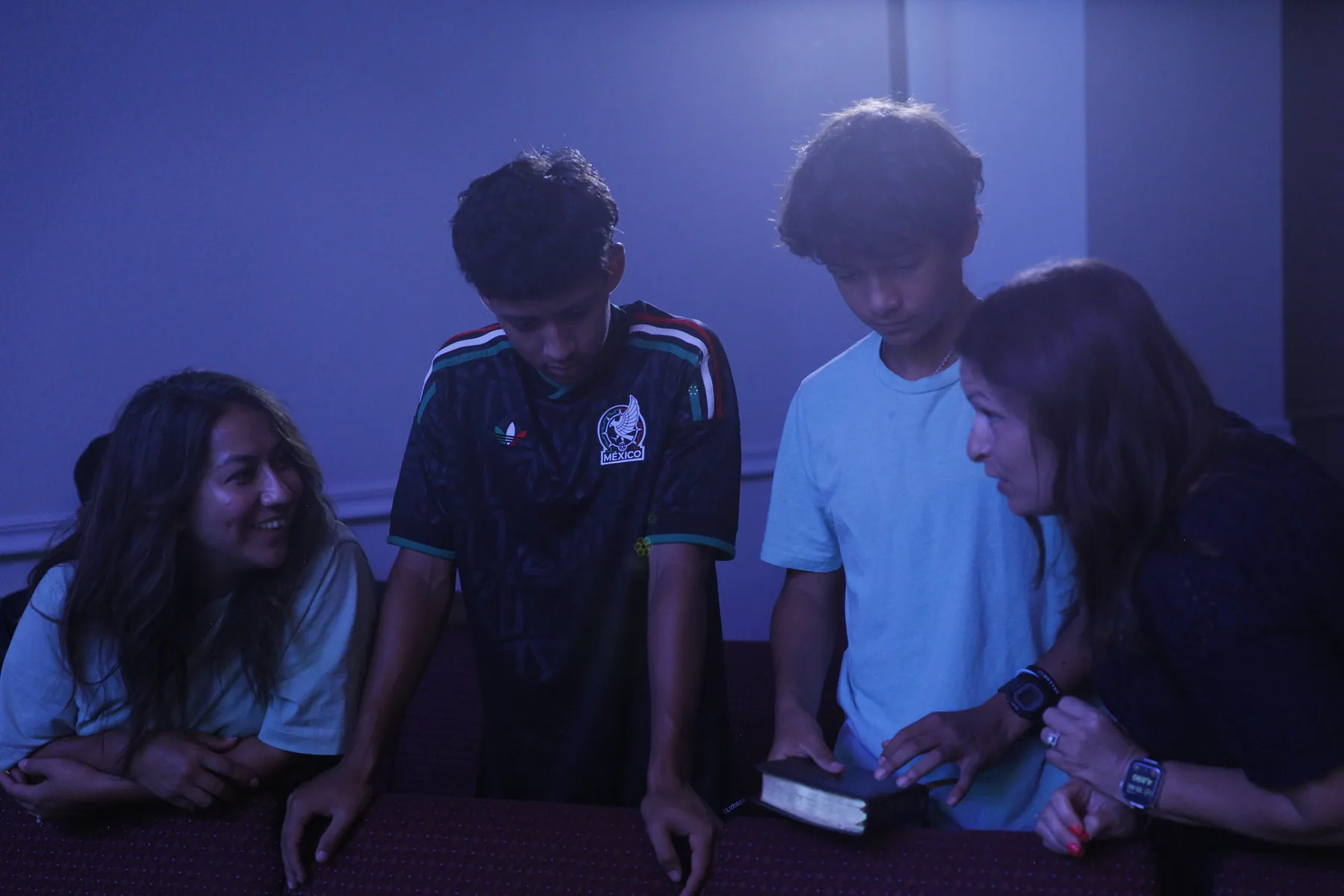 Students reading the Bible together